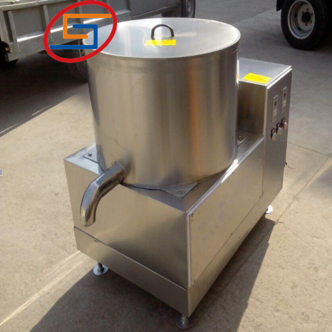 Vegetable dewatering machine